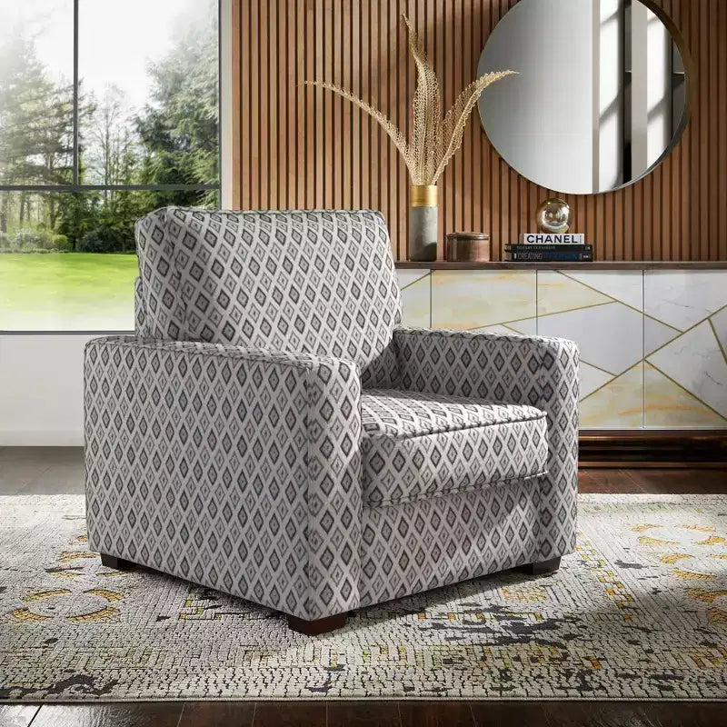 Poltrona di design con schienale e braccioli imbottiti