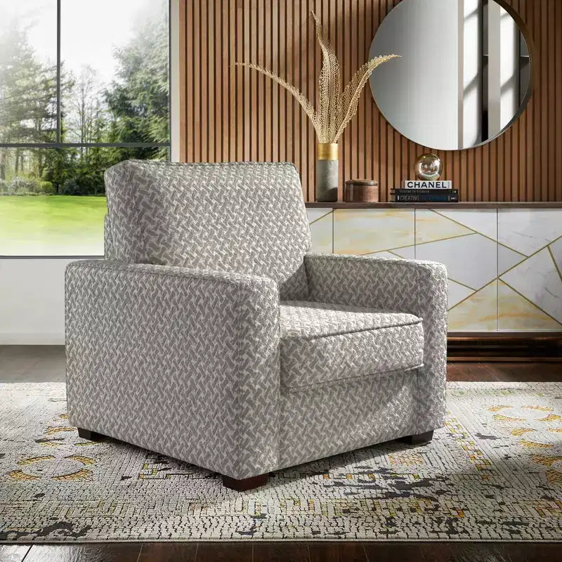 Poltrona di design con schienale e braccioli imbottiti